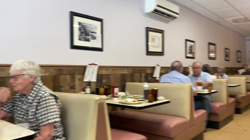 Warm interior with coffee cups and booths